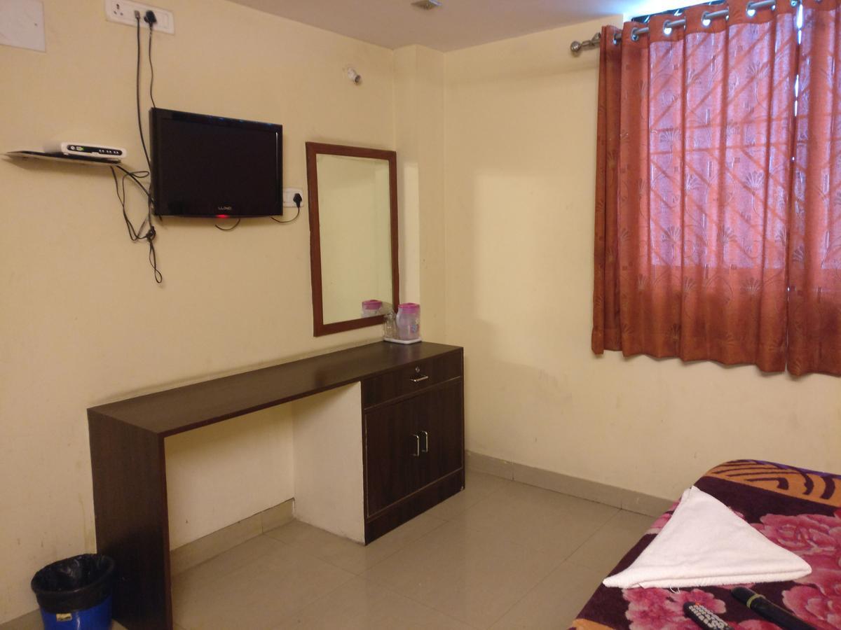 Hotel Skyland Bangalore Bagian luar foto