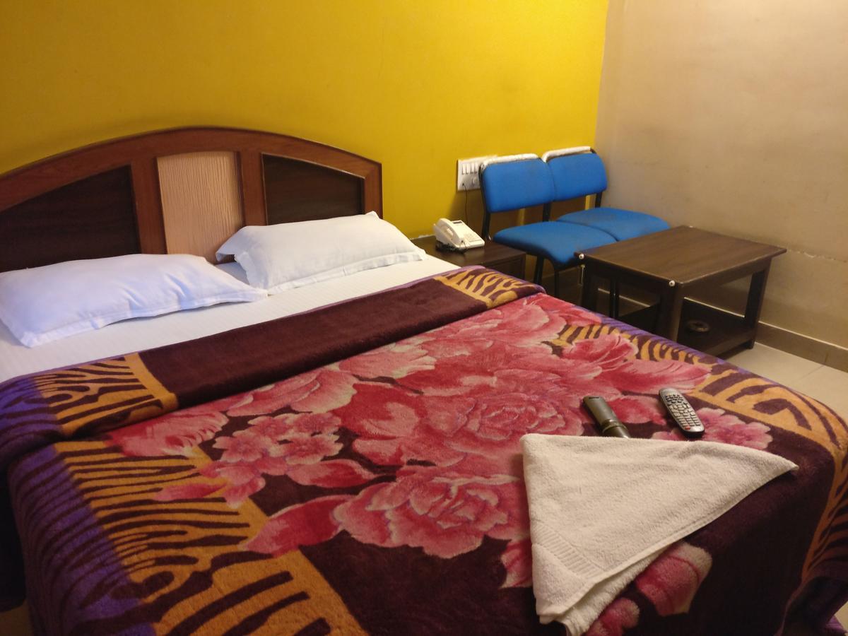 Hotel Skyland Bangalore Bagian luar foto
