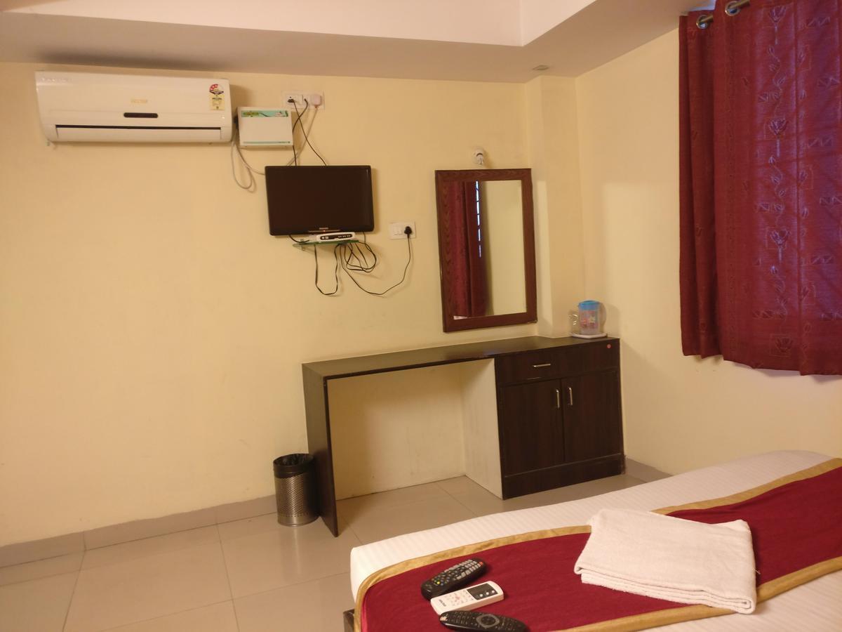Hotel Skyland Bangalore Bagian luar foto