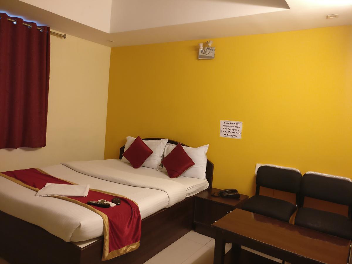 Hotel Skyland Bangalore Bagian luar foto