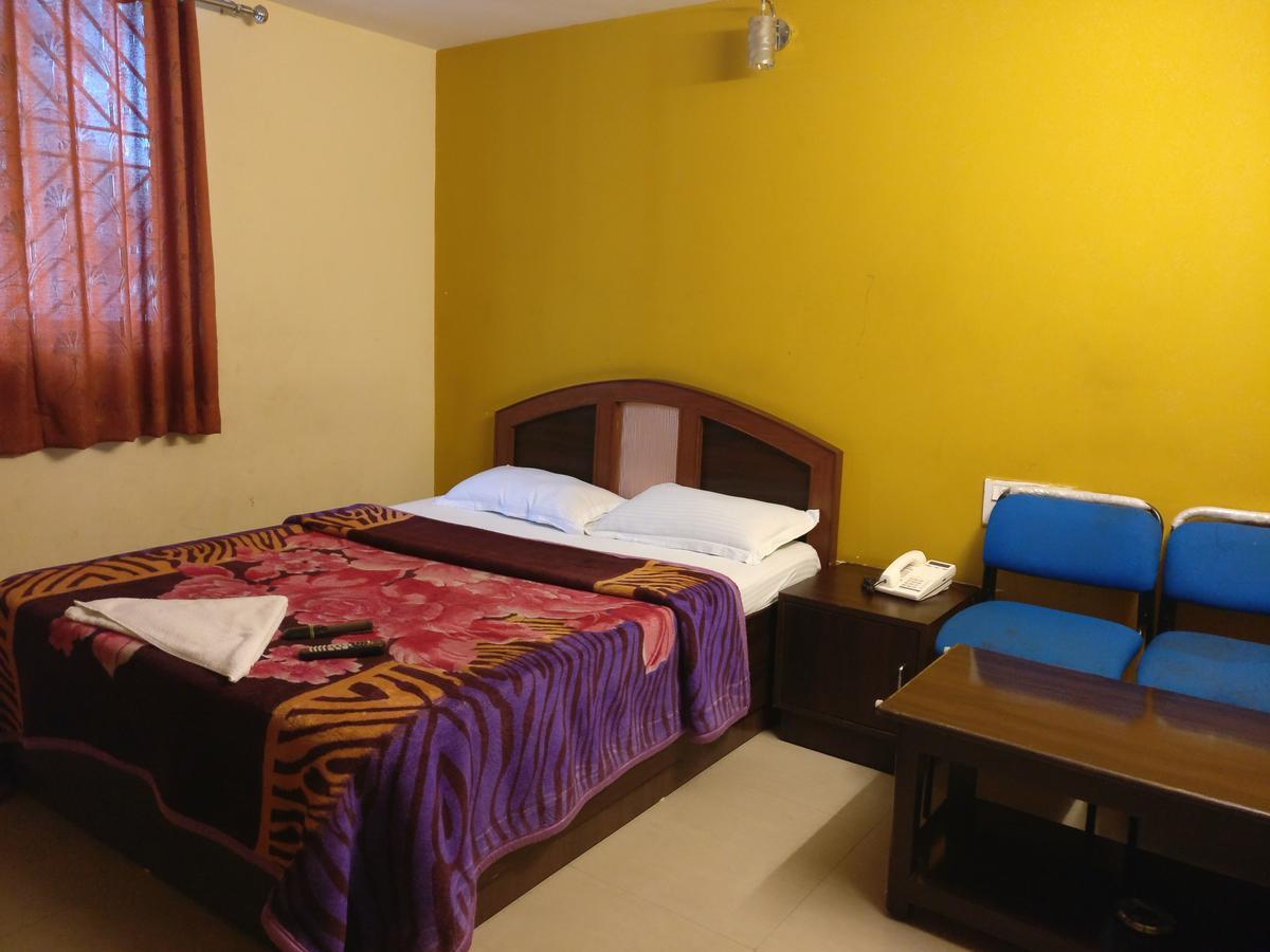Hotel Skyland Bangalore Bagian luar foto